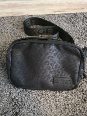 Black Crossbody Bag with Subtle Pattern